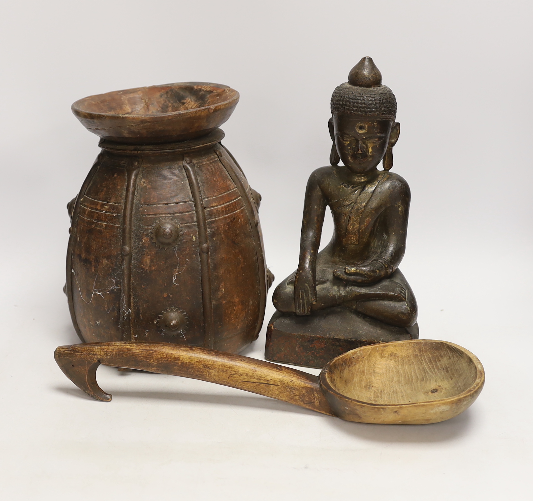 A Burmese lacquered wood figure of Buddha with traces of gilding, 28.5cm, and two other wooden items